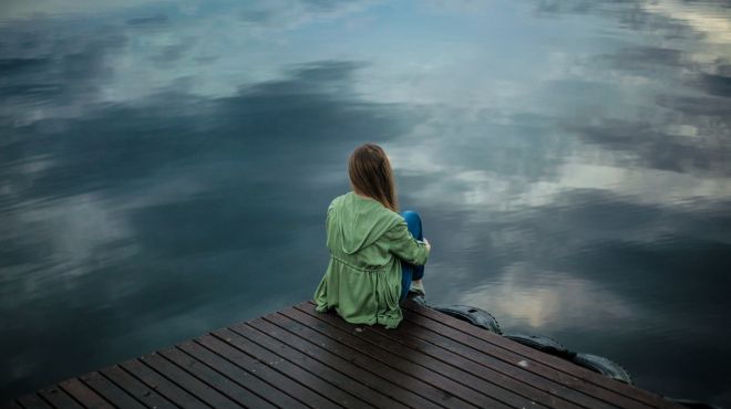 women dream of being left behind and sitting alone near a lake