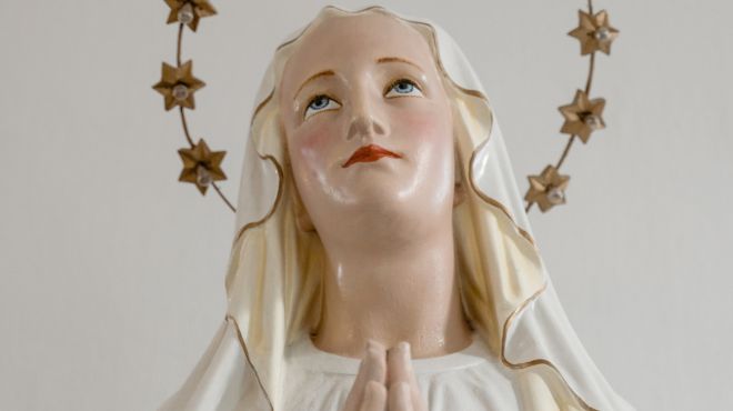 virgin Mary statue inside a church