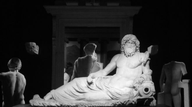 statue of a greek god in dreams