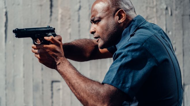 old man dreaming of shooting someone in self-defense to protect himself and others