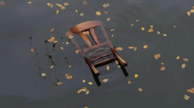 man dreams about a floating chair